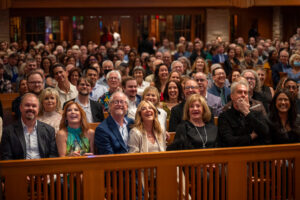 Audience laughing